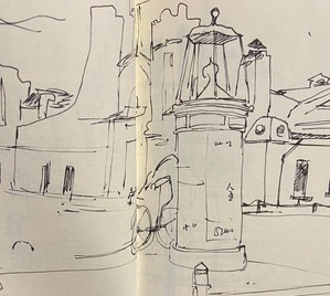 図６　広告塔と人力車　『TATEMONO』より