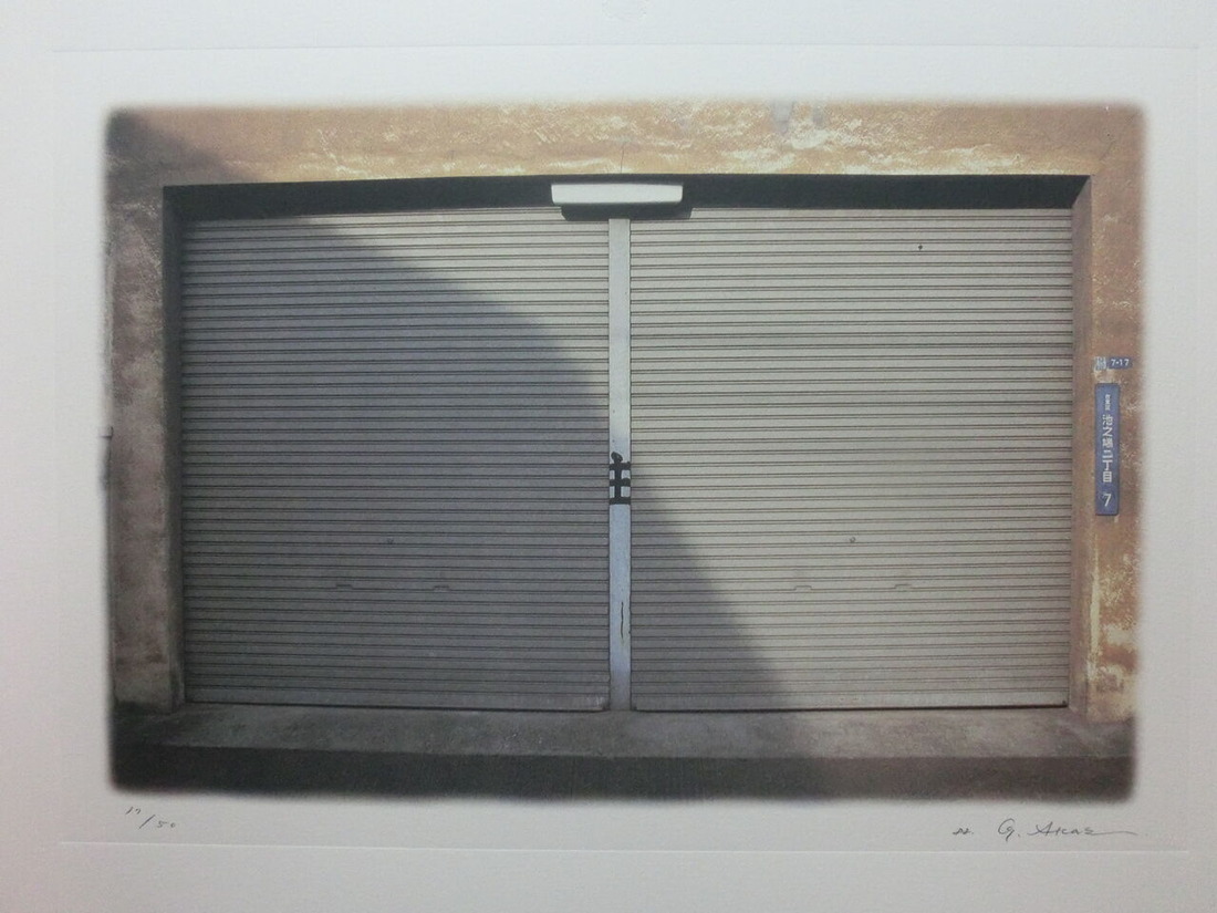 12 「駐車場の中の主」