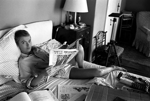 A284_Seberg-on-Bed-with-Paper2